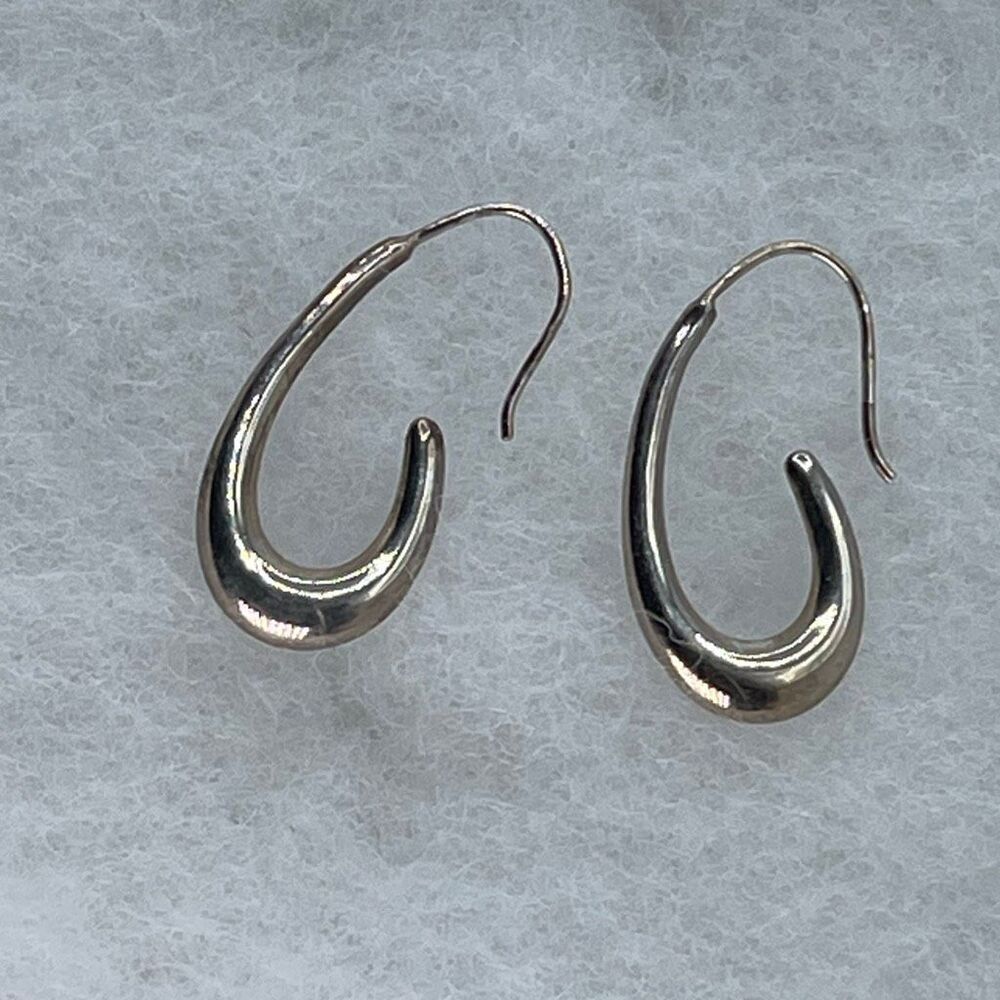 Sterling Silver teardrop style hook pierced earrings.